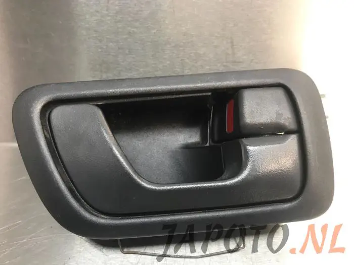 Uchwyt drzwi prawych wersja 2-drzwiowa Mitsubishi Pajero