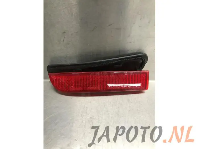 Element odblaskowy zderzaka lewy tyl Toyota Avensis